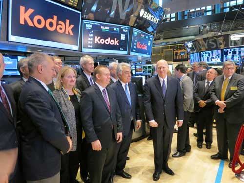 Perez poses with other Kodak executives on the trading floor of the NYSE